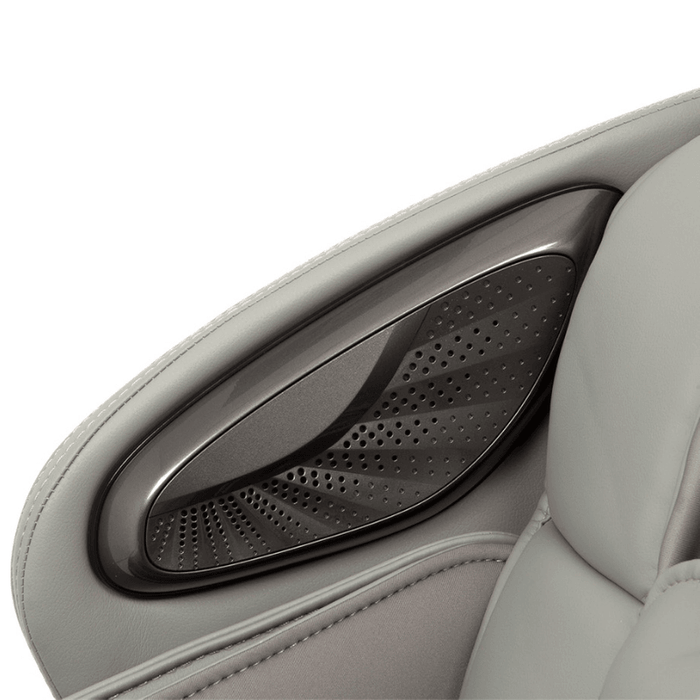 Close-up of the Bluetooth speakers integrated into the Osaki Admiral II Open Box Floor Model massage chair, highlighting their modern design and wireless connectivity for an enhanced audio experience during relaxation.
