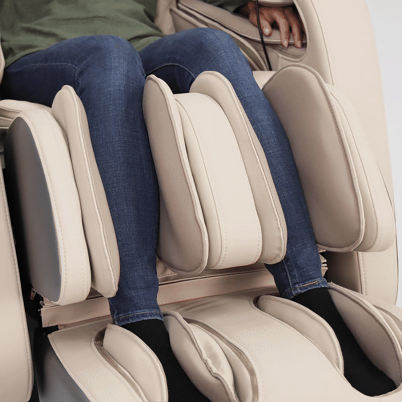 Kyota Joubu M880 4D massage chair performing Tuina adjustment and calf-kneading massage on lower legs.