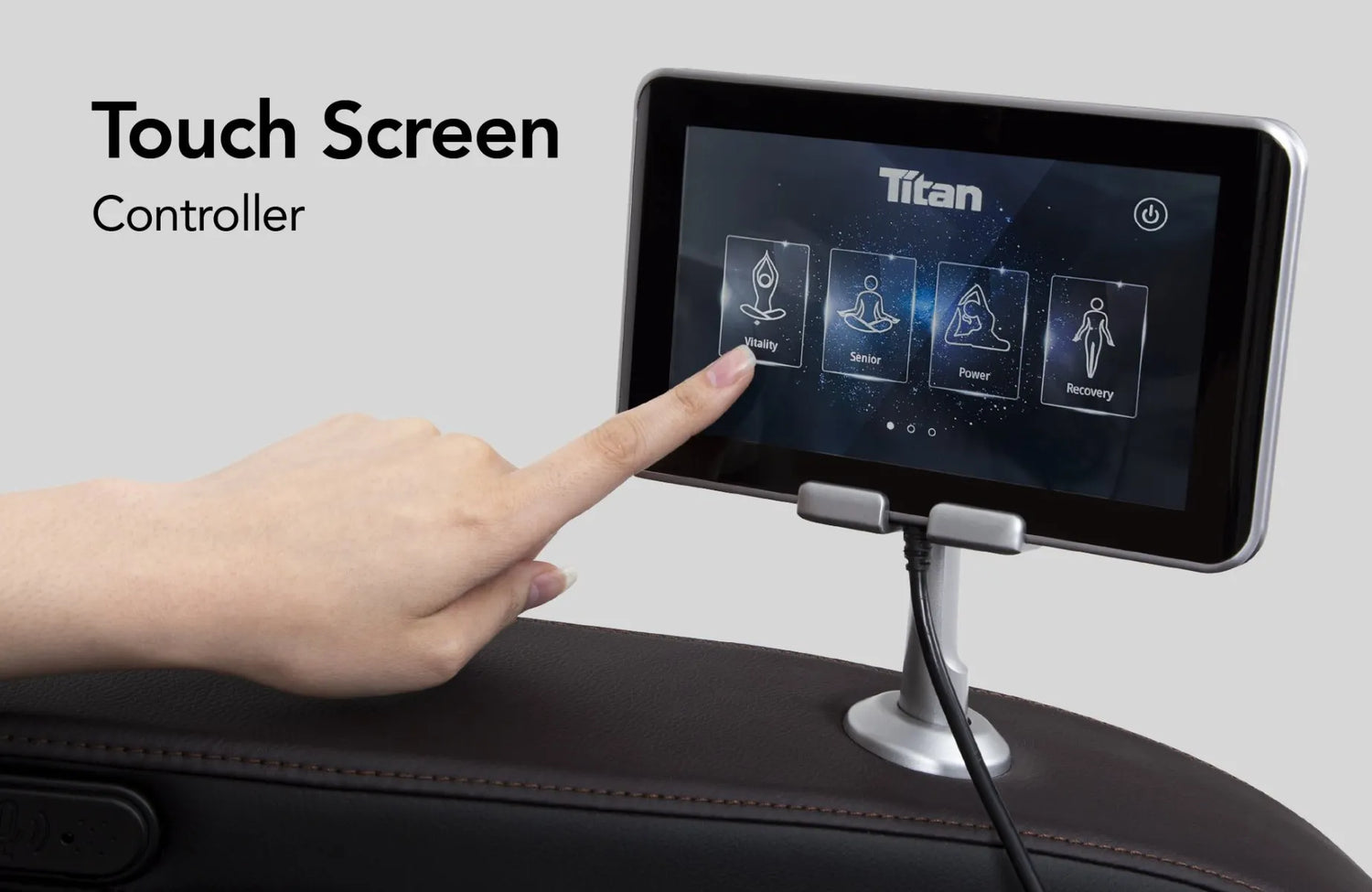 Image showcasing the touchscreen tablet remote of the Titan Jupiter Premium LE open box floor model massage chair, highlighting its user-friendly interface that allows users to easily navigate through massage settings, programs, and adjustments for a personalized and convenient massage experience.