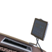 Close-up of the brown Infinity Circadian 4D DualFlex Massage Chair's 8-inch touchscreen tablet remote and integrated wireless charging pad, offering intuitive control and convenient device charging.