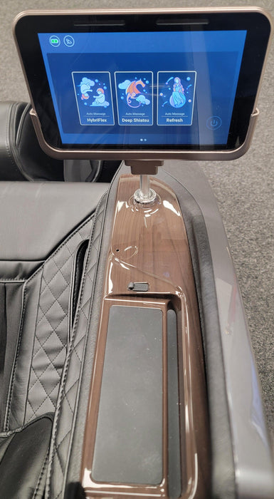 Close-up image of the touchscreen tablet control for the Daiwa Supreme Hybrid Massage Chair, displaying an intuitive interface for adjusting massage settings, intensity, and chair functions for a customized experience.