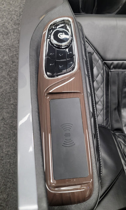 Close-up image of the side panel controls on the Daiwa Supreme Hybrid Massage Chair, featuring intuitive buttons for easy adjustment of massage settings, intensity, and chair functions for a personalized experience.