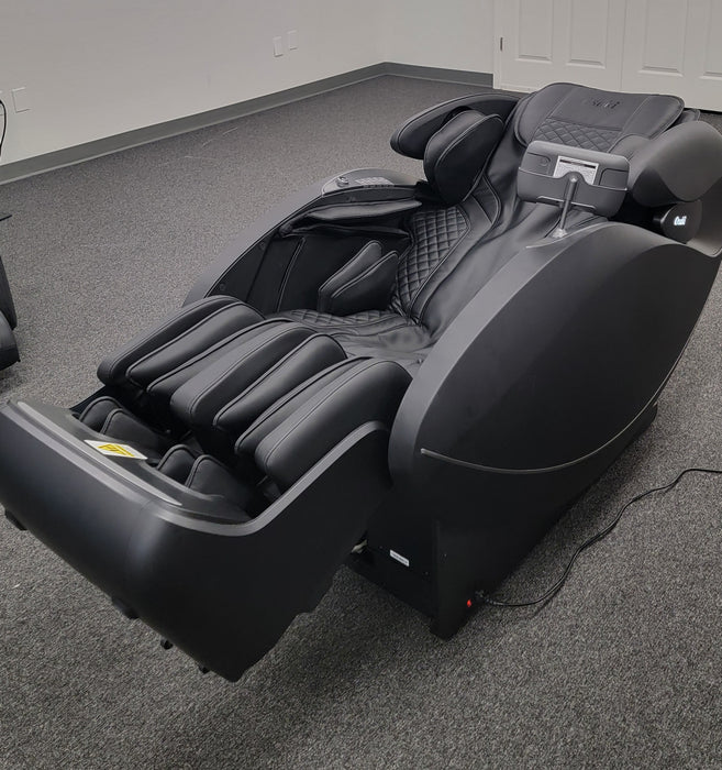 Image of the Osaki Solis 4D Massage Chair in black, positioned in zero gravity recline, with the chair tilted to evenly distribute body weight, elevate the legs, and enhance relaxation by reducing spinal pressure and improving circulation.