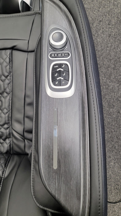 Close-up of the quick access controls on the Osaki Manhattan Duo Mech 4D Massage Chair, featuring intuitive buttons and easy-to-use interface for seamless adjustment of settings and massage modes.