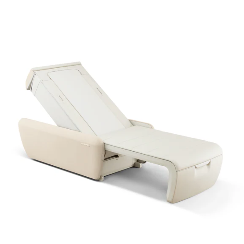 Angled view of CERAGEM V9 massage bed in beige showcasing its ergonomic design and premium therapeutic features.