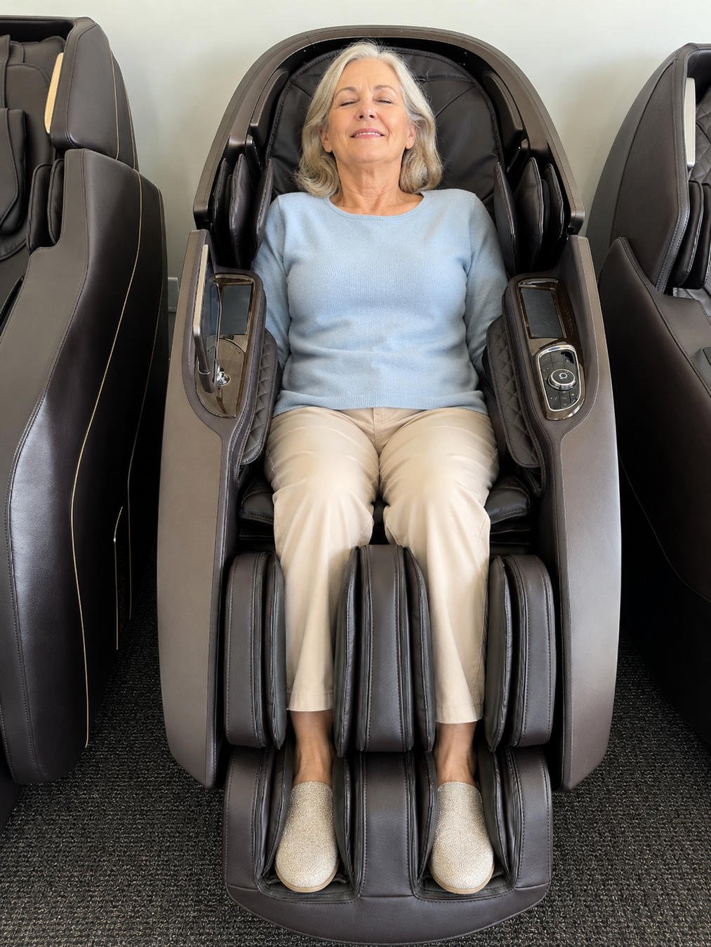 Woman relaxing in a luxury massage chair at The Modern Back Orlando massage chair showroom.