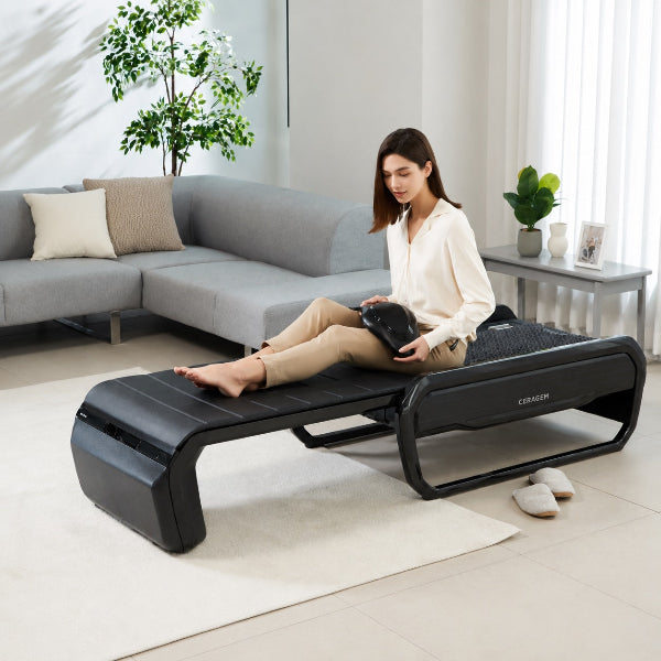 Ceragem V6 massage bed in use, illustrating FDA-cleared therapeutic benefits for relieving muscle and joint pain, improving circulation, and promoting relaxation.