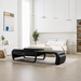 Ceragem V6 massage bed in black placed in a minimalist-inspired living room with neutral tones, modern decor, and soft natural lighting.