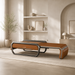 Ceragem V6 massage bed in camel brown displayed in a minimalist room with warm neutral tones, natural textures, and contemporary furnishings.