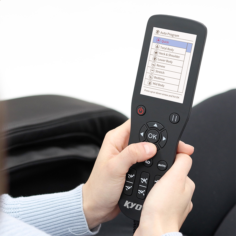 Kyota Yugana M780 4D Massage Chair color touchscreen remote showing menu interface with 13 auto massage programs.