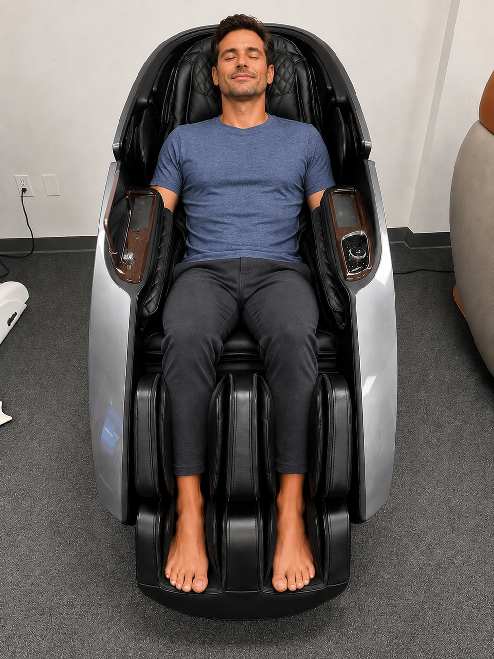 Customer enjoying a relaxing massage in the Daiwa Supreme Hybrid massage chair at The Modern Back showroom in Columbia, Maryland.
