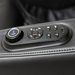 Close-up of Daiwa iLift massage chair armrest quick access controls for adjusting massage settings