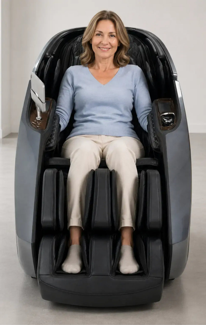Middle-aged woman enjoying a massage in the gray Daiwa Supreme Hybrid X massage chair in a modern minimalist room.