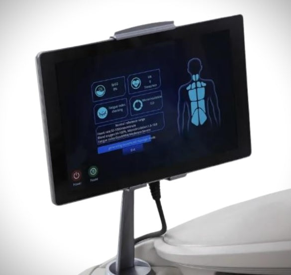 Osaki DuoMax SE Massage Chair Intelligent Health Detection screen displaying biometric metrics such as heart rate, blood oxygen levels, and fatigue index, with color-coded results indicating areas of tension.
