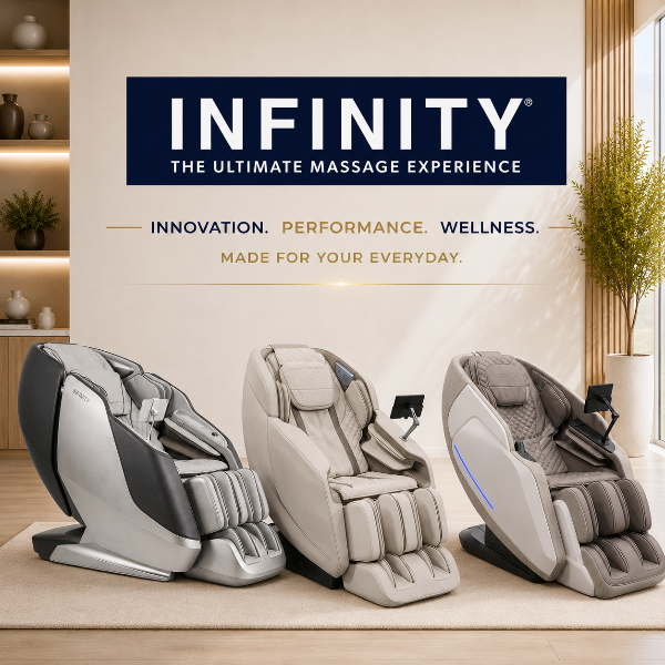Three Infinity massage chairs in silver, beige, and taupe are lined up in a modern, sunlit room with a large brand logo displayed on the wall above them.