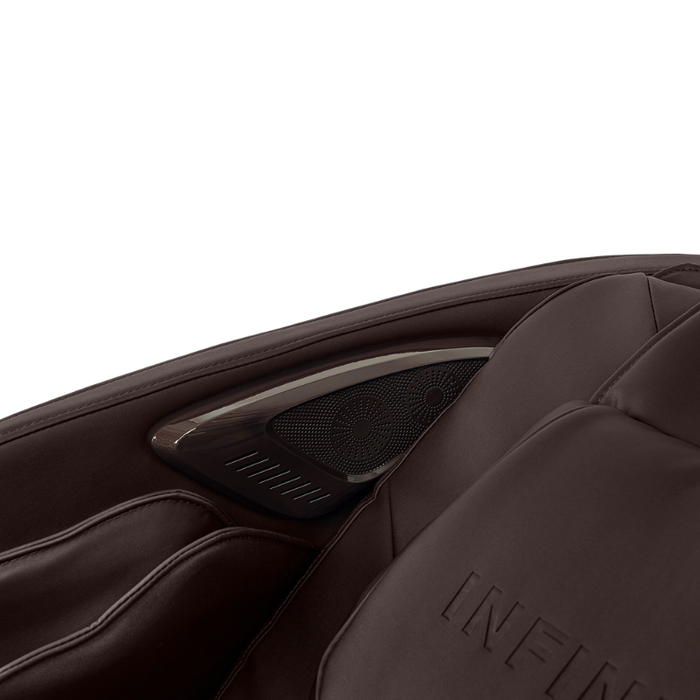 Close-up of the built-in Bluetooth speaker on the Infinity Solstice Deluxe Massage Chair, seamlessly integrated into the headrest for immersive sound.
