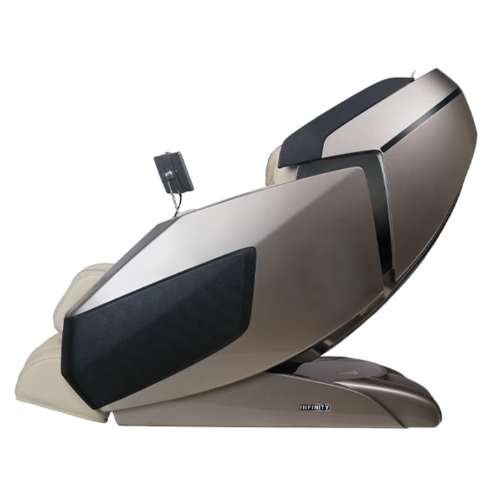 Side view of the grey and tan Infinity Ultra Imperial Syner-D massage chair highlighting its contemporary design and space-saving recline technology.