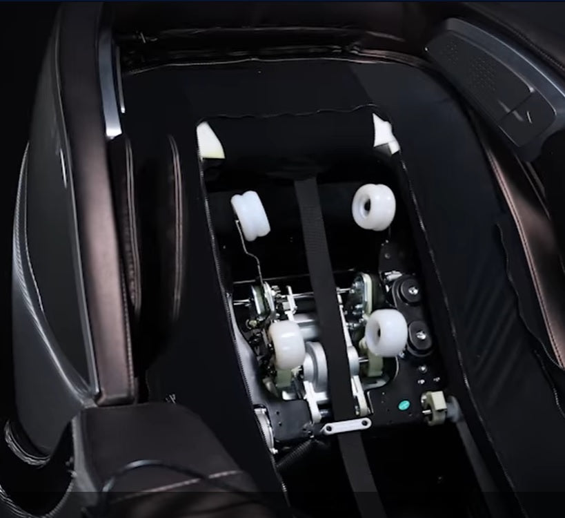 Close-up view of 4D Quad Rollers and L-Track Technology in the Infinity Genesis Max massage chair, showcasing advanced roller mechanisms that provide a lifelike massage experience from neck to glutes.