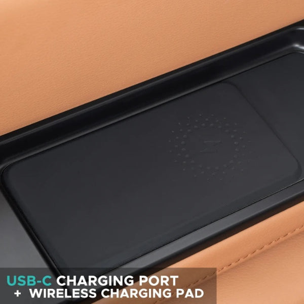 Armrest console featuring a wireless phone charging pad and USB-C port on the Infinity Serenza Flex massage chair.
