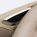 Close-up of the Bluetooth speaker system on the beige Infinity Sovana 4D DualPro massage chair, showing integrated audio feature for immersive sound.