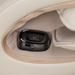 Close-up of the intelligent health detection sensor on the beige Infinity Sovana 4D DualPro massage chair, showing built-in health monitoring feature.