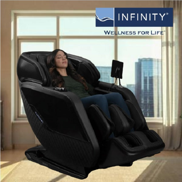 Infinity Sovana 4D DualPro Massage Chair in sleek black finish, placed in a modern living room setting with stylish décor and natural lighting.