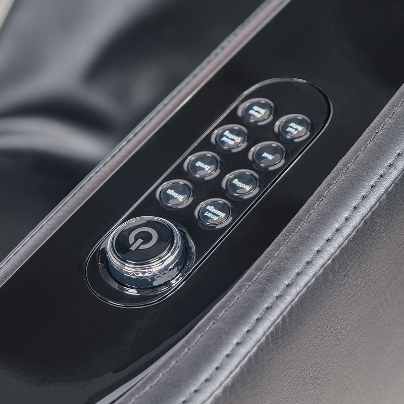 Kyota Kizuna M688 massage chair quick access control panel with dial and adjustment buttons.