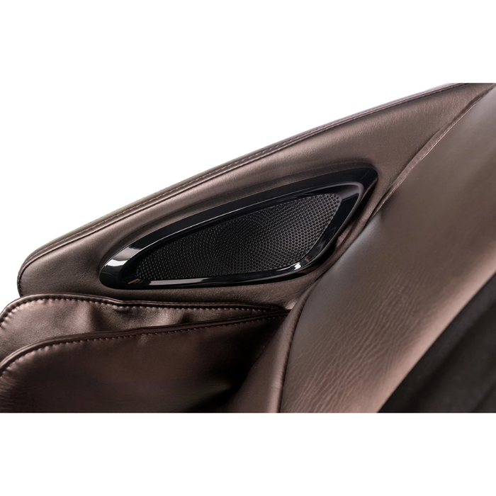 Close-up of the brown Kyota Kizuna M688 massage chair’s built-in Bluetooth speaker in the headrest.
