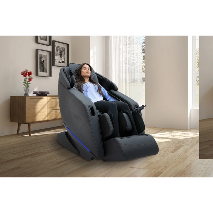 Kyota Yugana M780 4D Massage Chair in sleek black leather-finish, front view placed in a modern living room setting with extended leg rest and ambient décor.