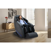 Kyota Yugana M780 4D Massage Chair in sleek black leather-finish, front view placed in a modern living room setting with extended leg rest and ambient décor.