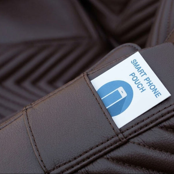 Luraco i9 Max Special Edition smartphone charging pouch holding and charging a smartphone during massage.