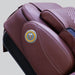 Close-up of the Luraco iRobotics i11 Special Edition Medical Massage Chair in chocolate brown leather, featuring the Made in America emblem and premium stitched upholstery.
