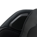 Close-up of built-in Bluetooth speakers on the Osaki 4D YogaFlex chair, showing speaker grilles integrated into the headrest/armrest area against plush upholstery.