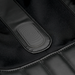 Close-up of the YogaFlex massage chair’s seat section vibrating, with subtle wave-pattern upholstery wrinkles indicating motion.