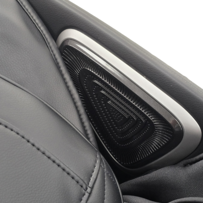 Bluetooth speakers built into the Kairos Duo massage chair’s headrest, featuring dual mesh drivers and ambient LED lighting for immersive audio.