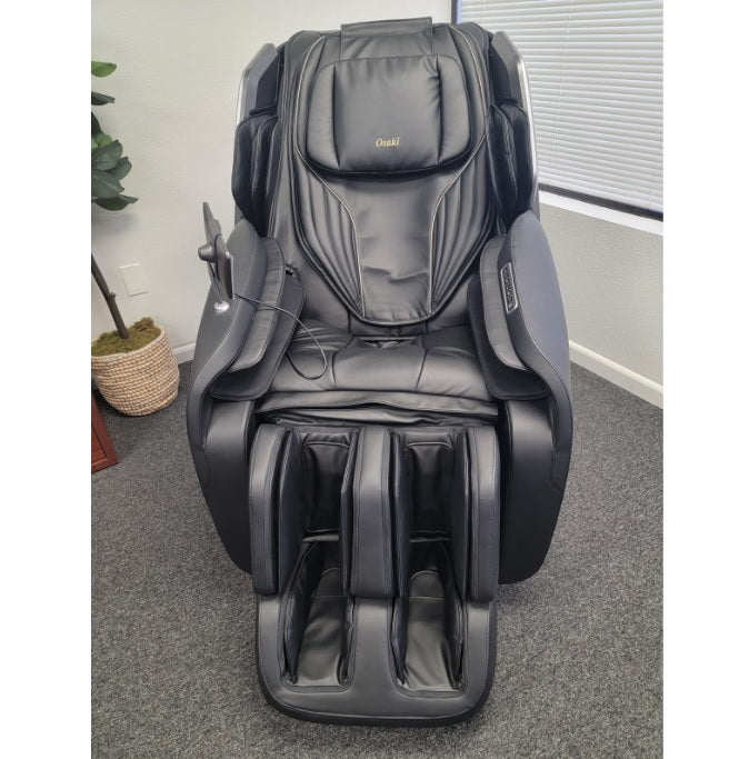 Osaki Atlas XL 4D massage chair in black featured in the Osaki clearance sale at The Modern Back.