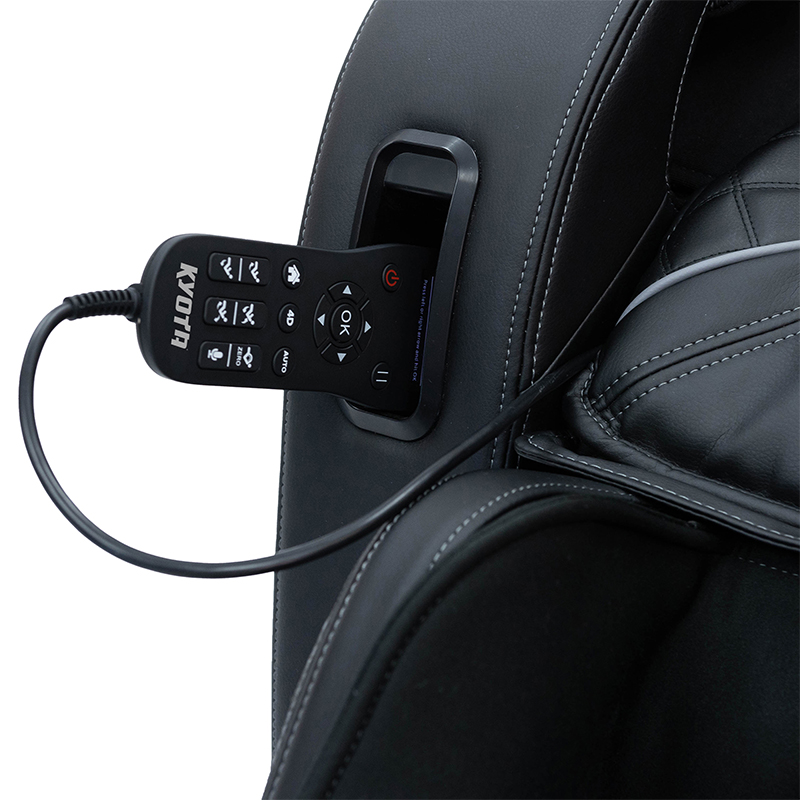 Kyota Yugana M780 4D Massage Chair remote control holder keeping the tablet-style controller securely in place for easy access.