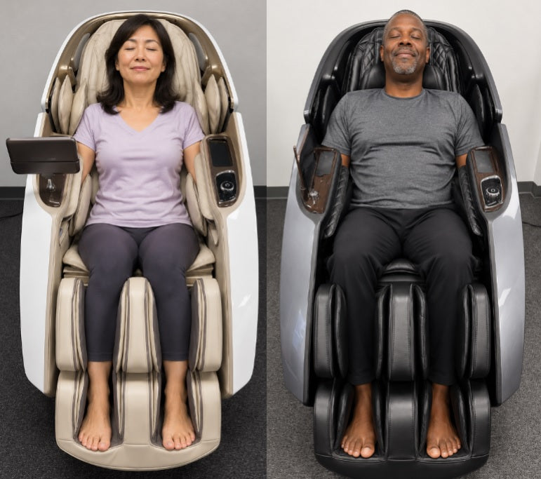 Two customers trying premium massage chairs before purchasing at The Modern Back's Kent, Washington showroom.