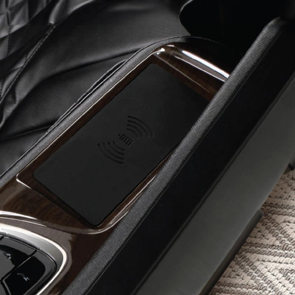 Wireless charging pad built into massage chair armrest of the Supreme Hybrid X.