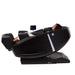 Close side view of person in zero gravity on black Supreme Hybrid X massage chair.