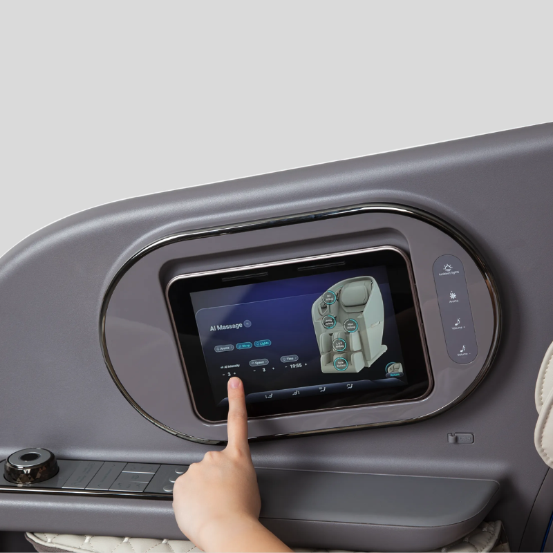 The Osaki Flagship massage chair features a wireless touchscreen tablet remote, conveniently mounted on the armrest, allowing users to easily adjust massage settings and control the chair.