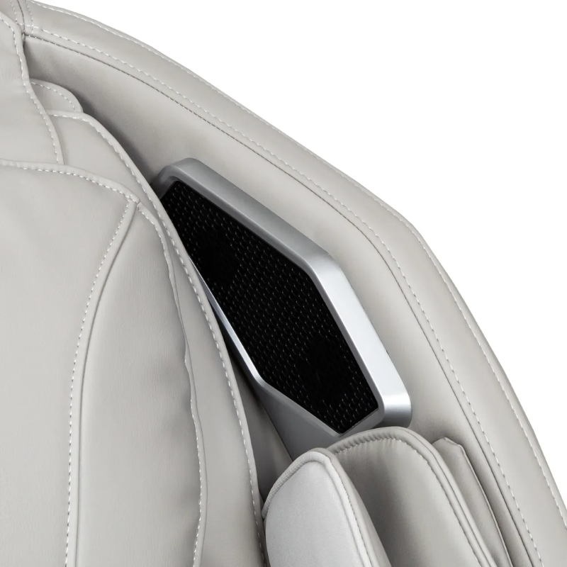 The Titan 4D Advent Massage Chair is equipped with premium Bluetooth speakers strategically mounted near the headrest, delivering an immersive surround sound experience.