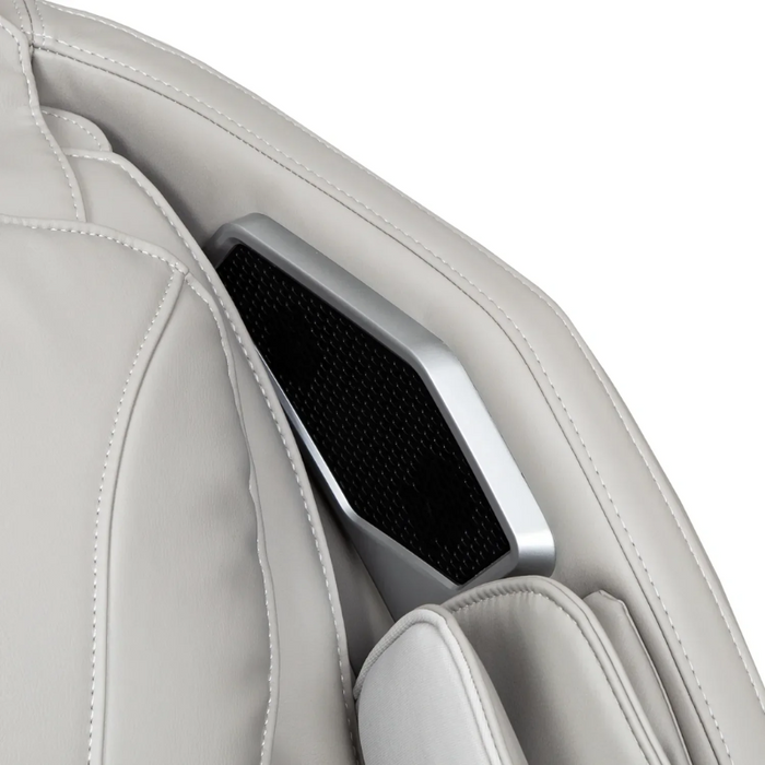 The Titan 4D Advent Massage Chair is equipped with premium Bluetooth speakers strategically mounted near the headrest, delivering an immersive surround sound experience.