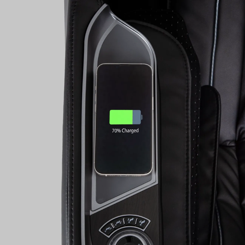 The Titan Ronin 4D Massage Chair comes equipped with a wireless phone charger, making it easy to keep your devices charged while you relax. This feature seamlessly integrates convenience into your massage experience, allowing you to enjoy a soothing session without worrying about low battery levels.