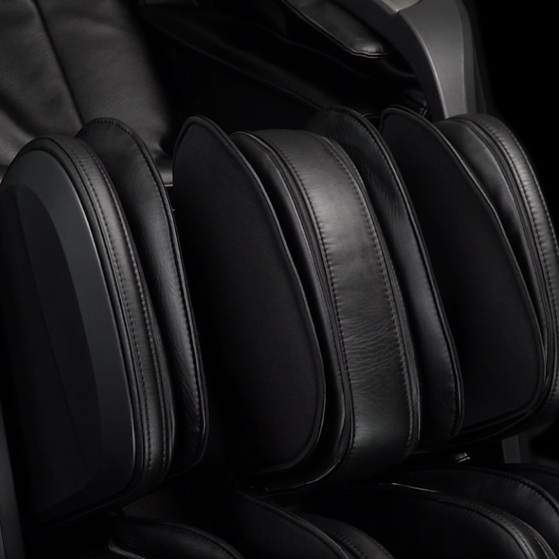 Osaki 4D Achilles massage chair with calf massage using kneading rollers and airbag compression to relieve tension.