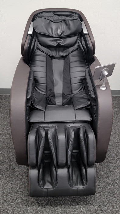 Front view of the brown Titan Jupiter Premium LE open box floor model massage chair, showcasing its sleek, ergonomic design with plush cushioning and advanced 3D massage rollers for a full-body therapeutic experience. 