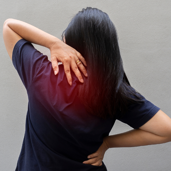 Massage chair targeting back and shoulders to help relieve muscle pain and tension in a home setting.
