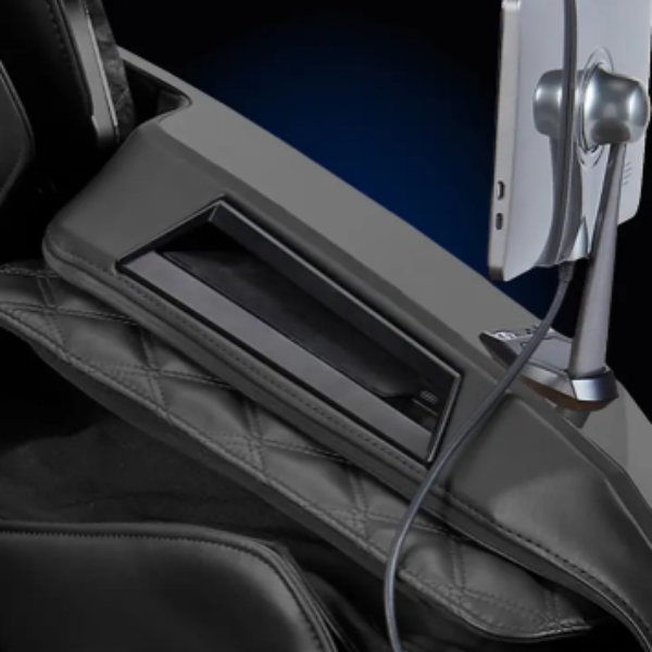 Close-up image of the Wireless Charging Pad and USB-C Charging Port on the Infinity Ultra Imperial Syner-D massage chair showcasing convenient built-in device charging features.